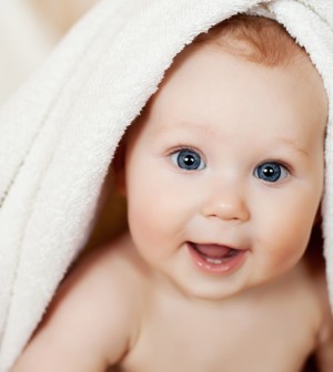 Baby Smiling under a Towel