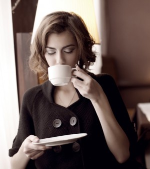 Woman Relaxing with a Cup of Valerian Tea
