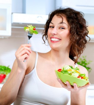 Woman with Salad on A Fork