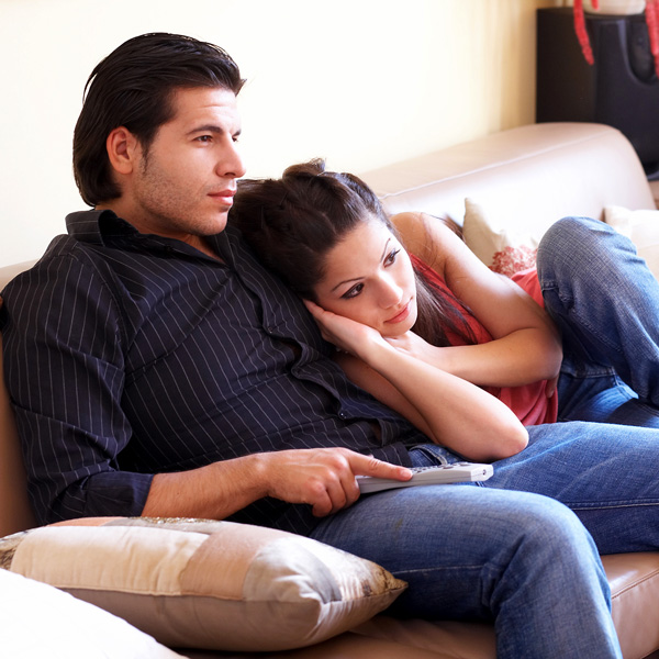 Guy and Girl Watching TV