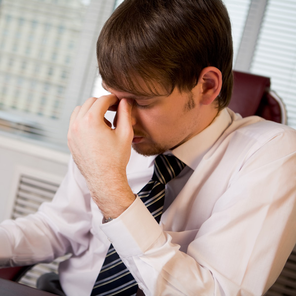 Man Falling Asleep at Work