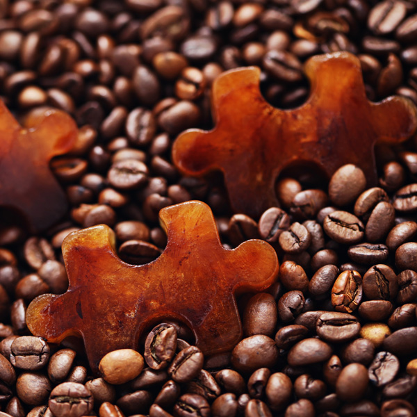 Puzzle pieces in coffee beans