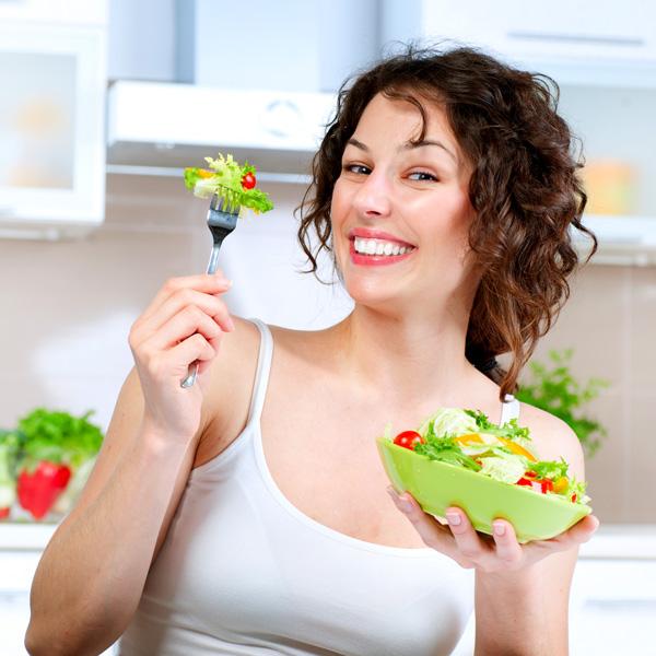 Woman with Salad on A Fork